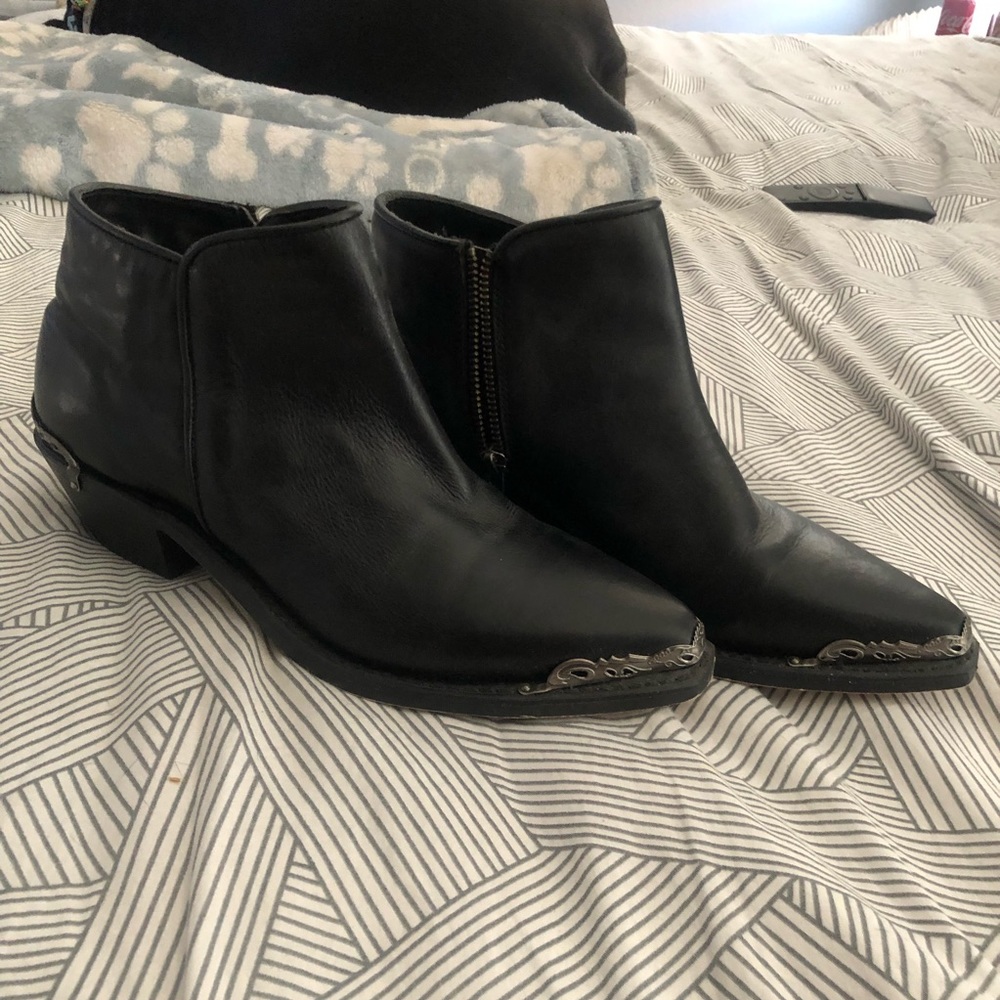 Low rise black pointed boots with metal toe piece